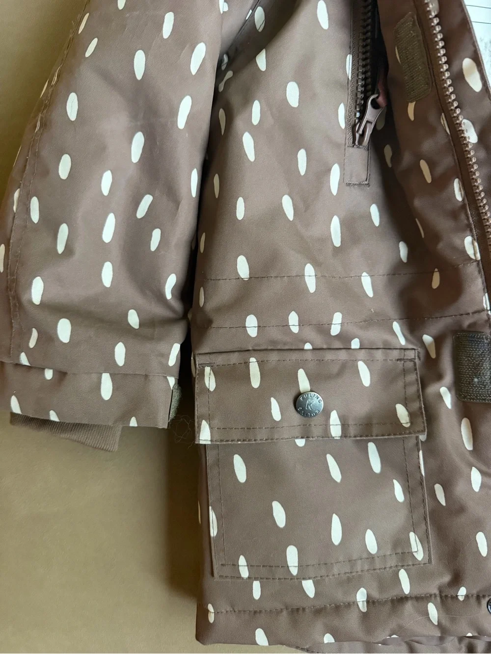 Kuling Brown Coat with White Dot Accents